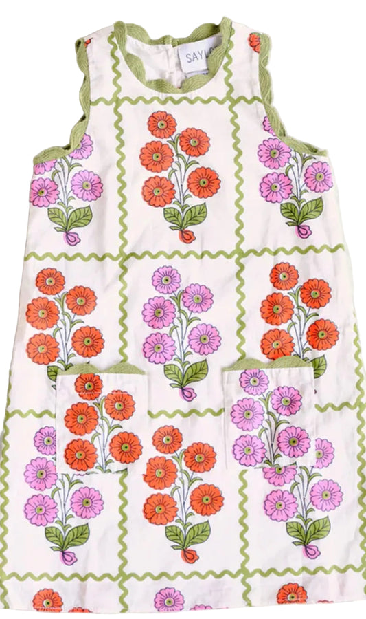 Children's dress with floral pattern on a white background