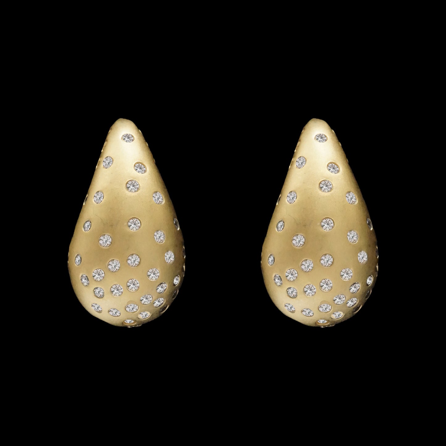 Matte gold teardrop earring with scattered CZ's