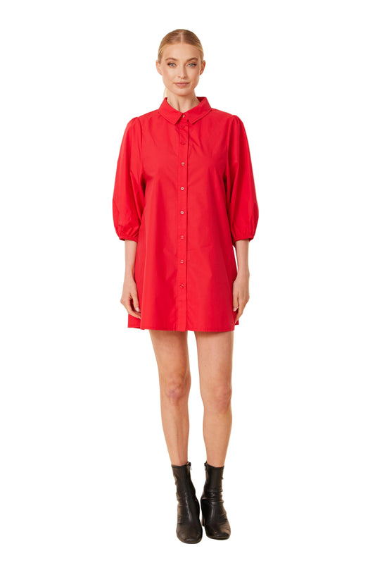 Front view of the red poplin exaggerated sleeve dress with button-down front and voluminous sleeves.