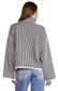 Back view of striped sweater – full-length back view highlighting stripes and fit.