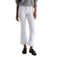 Person wearing white pants and black shoes on a plain background